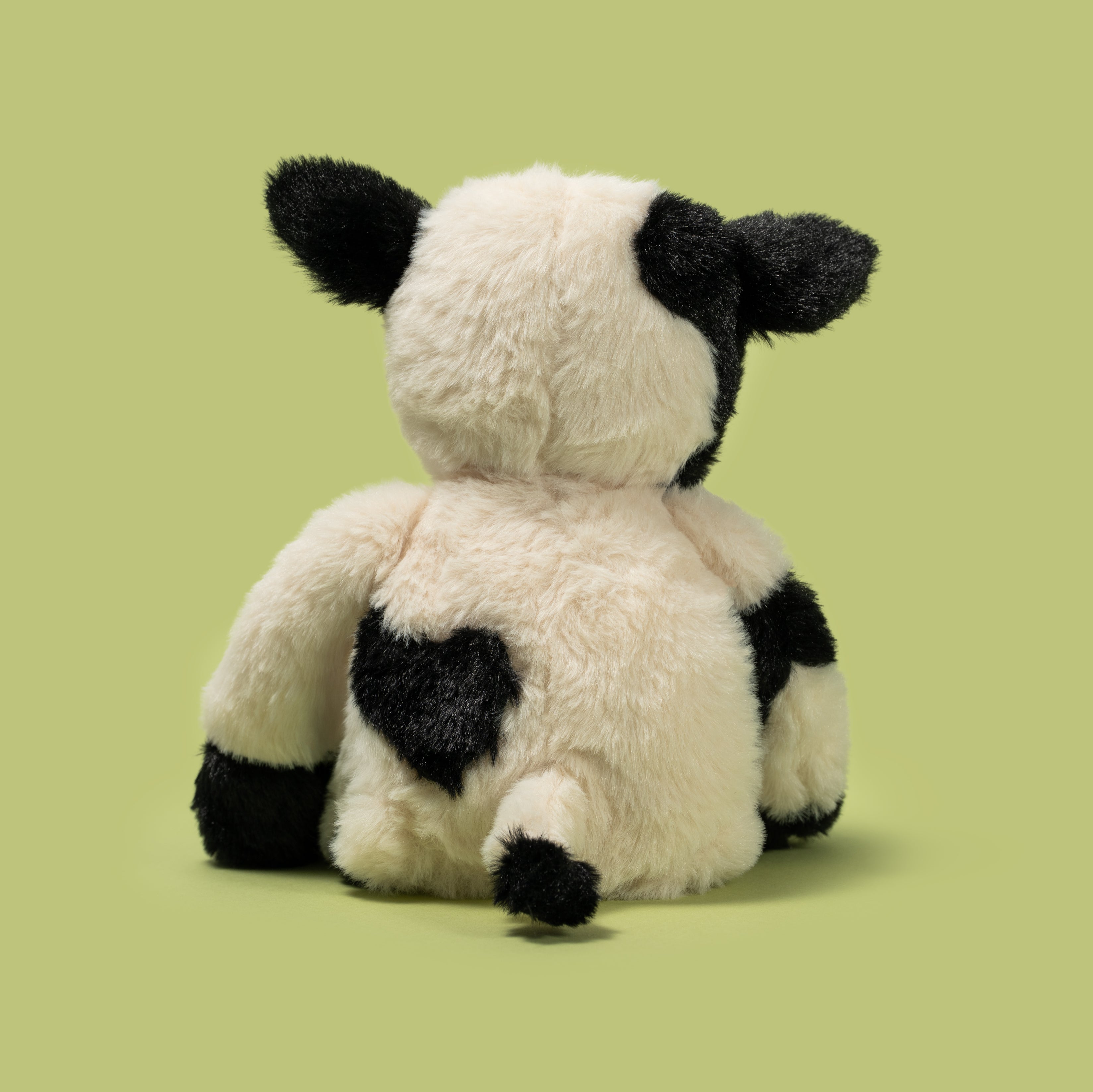 Pluszak krówka Wild Planet miękka zabawka w biało czarne łatki widok od tyłu