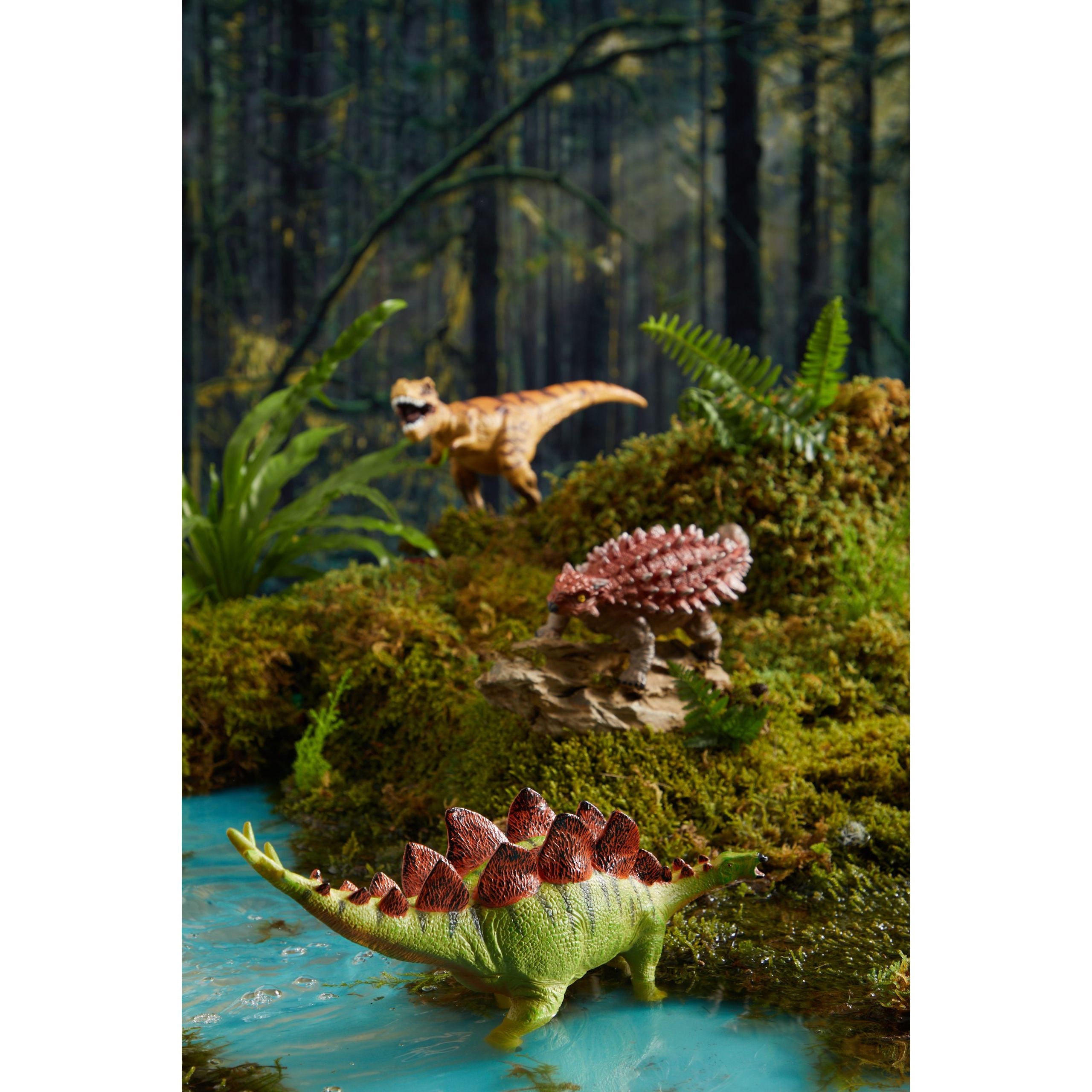 Zestaw figurek dinozaurów dla dzieci z realistycznymi modelami na tle leśnym z jeziorem