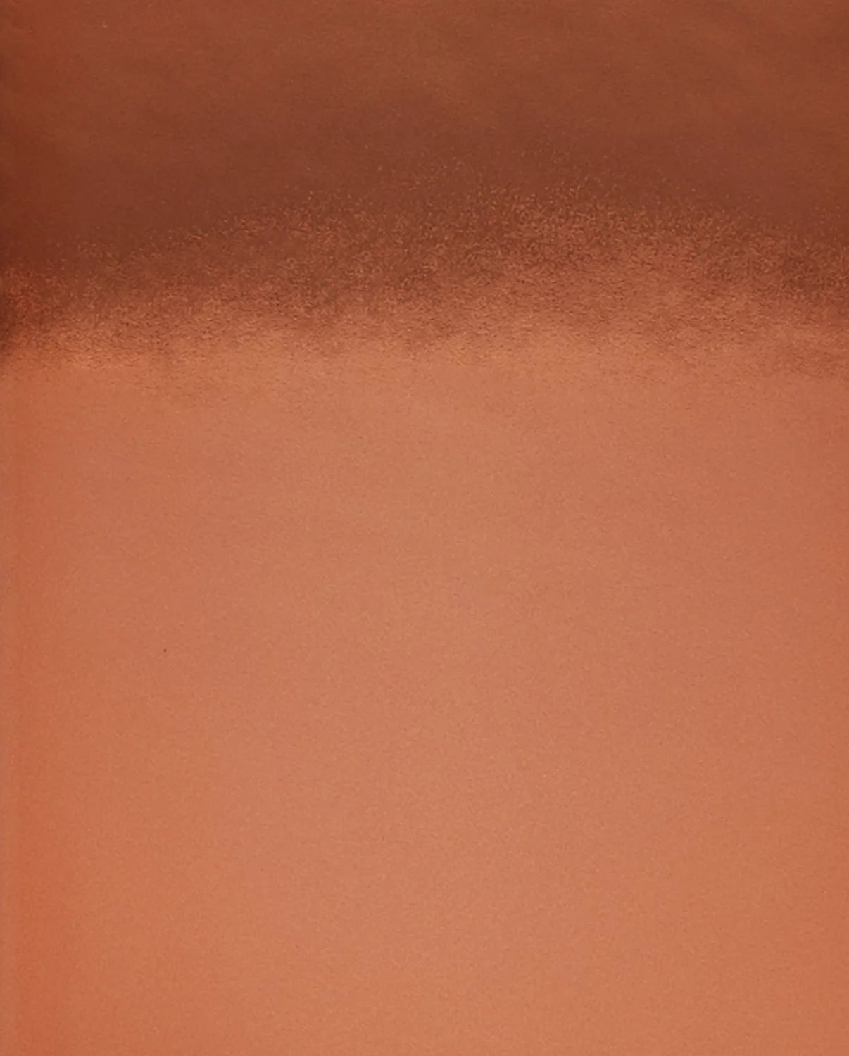 Minimalistyczny notatnik miedziany o gładkiej, metalicznej okładce idealny do zapisków i notatek