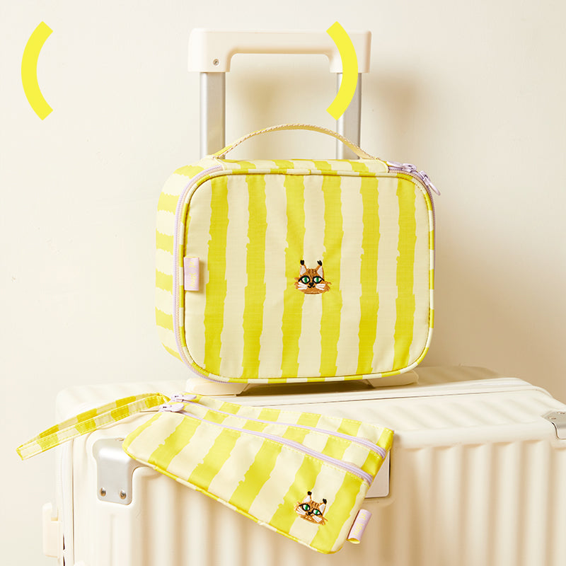 Wodoodporna kosmetyczka dla dzieci w żółte paski z motywem zwierzęcym na białej walizce