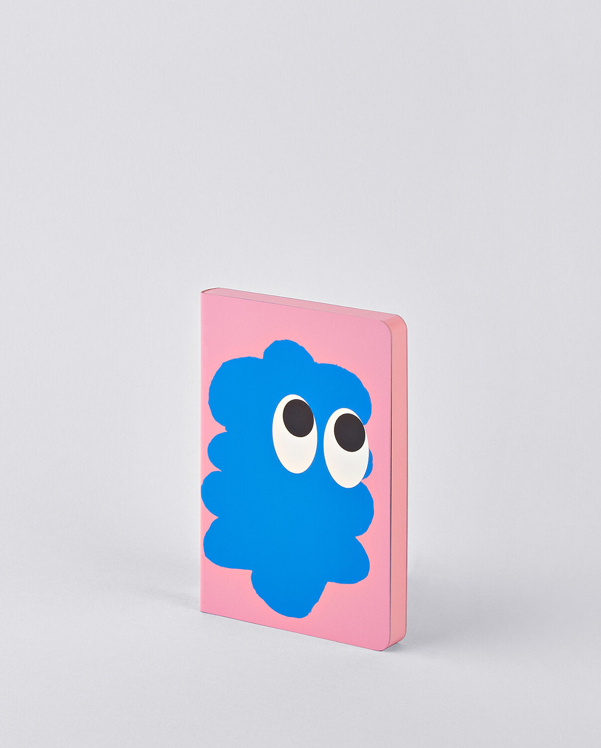 Notatnik z grafiką Sweet Joe w różowej okładce z niebieską postacią i dużymi oczami