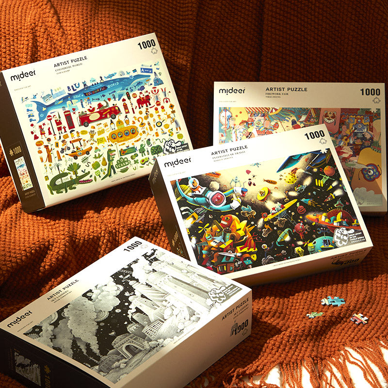 Puzzle artystyczne 1000 elementów marki mideer z różnorodnymi kolorowymi ilustracjami na opakowaniach