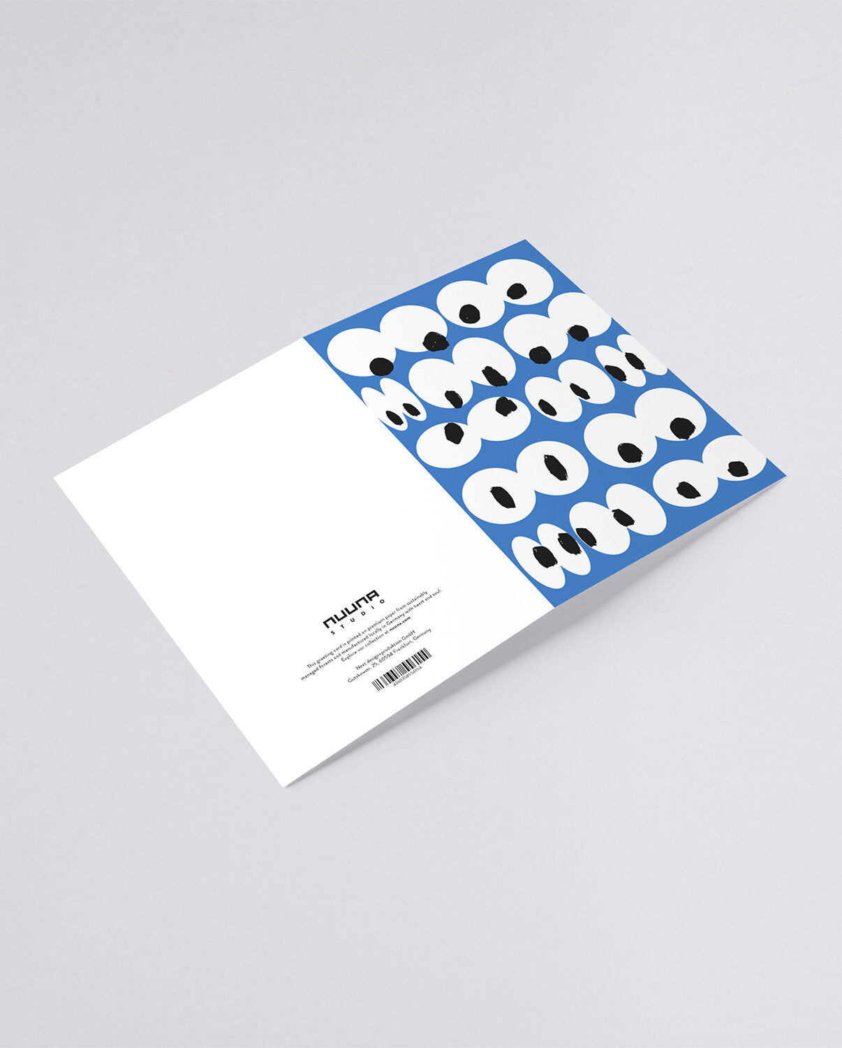 Kartka okolicznościowa z motywem oczu w białym i niebieskim kolorze marki BV JACOB COMPANY