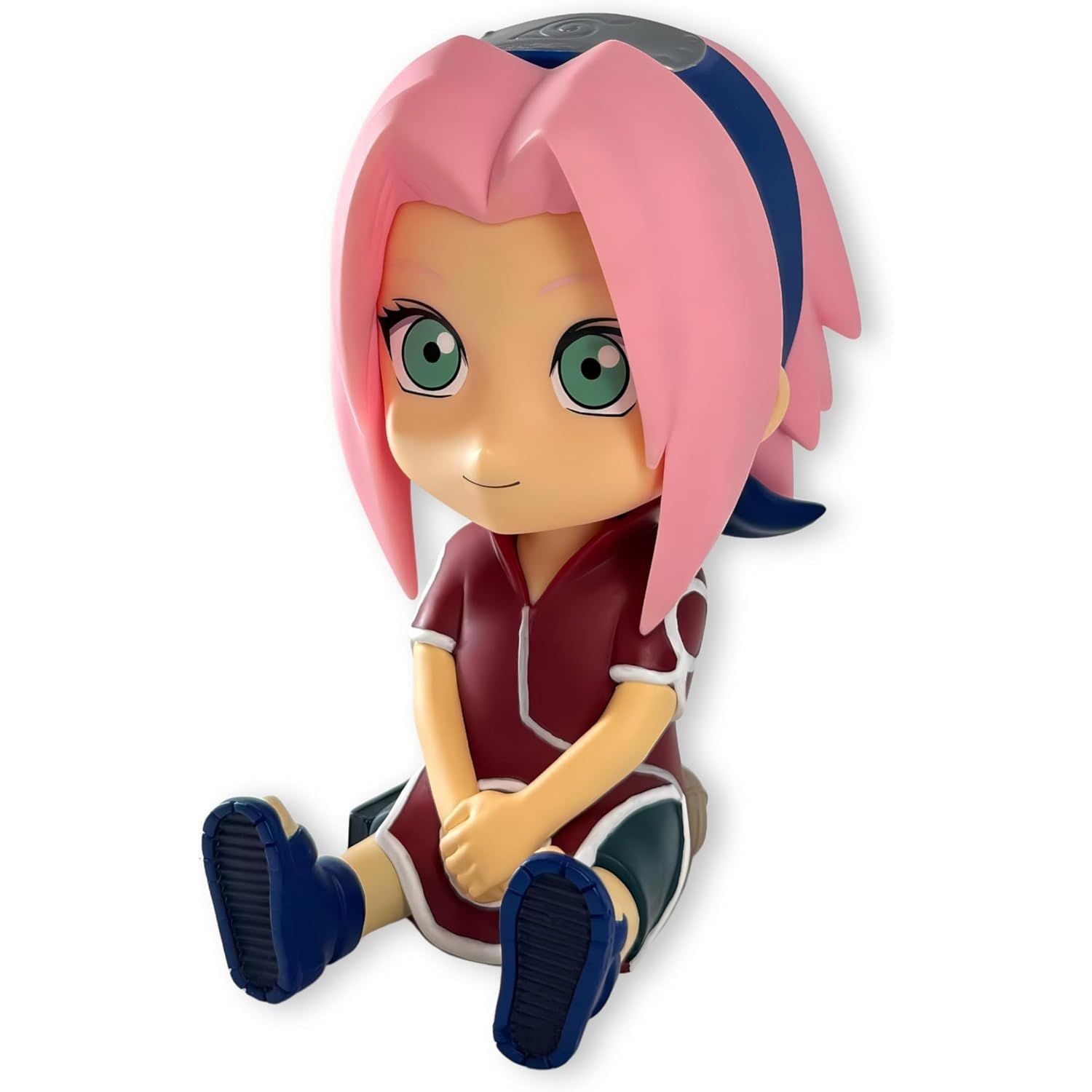 Plastoy skarbonka Naruto Sakura w formie siedzącej postaci z różowymi włosami i zielonymi oczami
