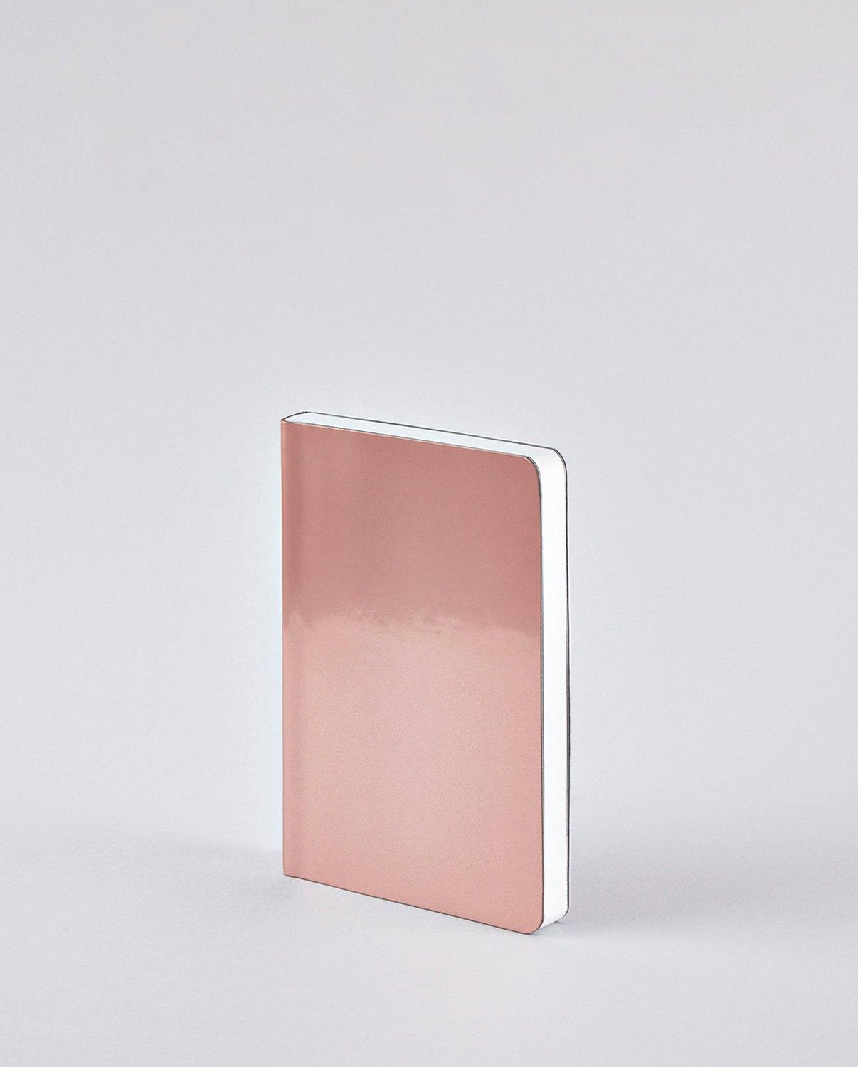 Notatnik różowy błyszczący o gładkiej powierzchni i zaokrąglonych rogach firmy BV JACOB COMPANY