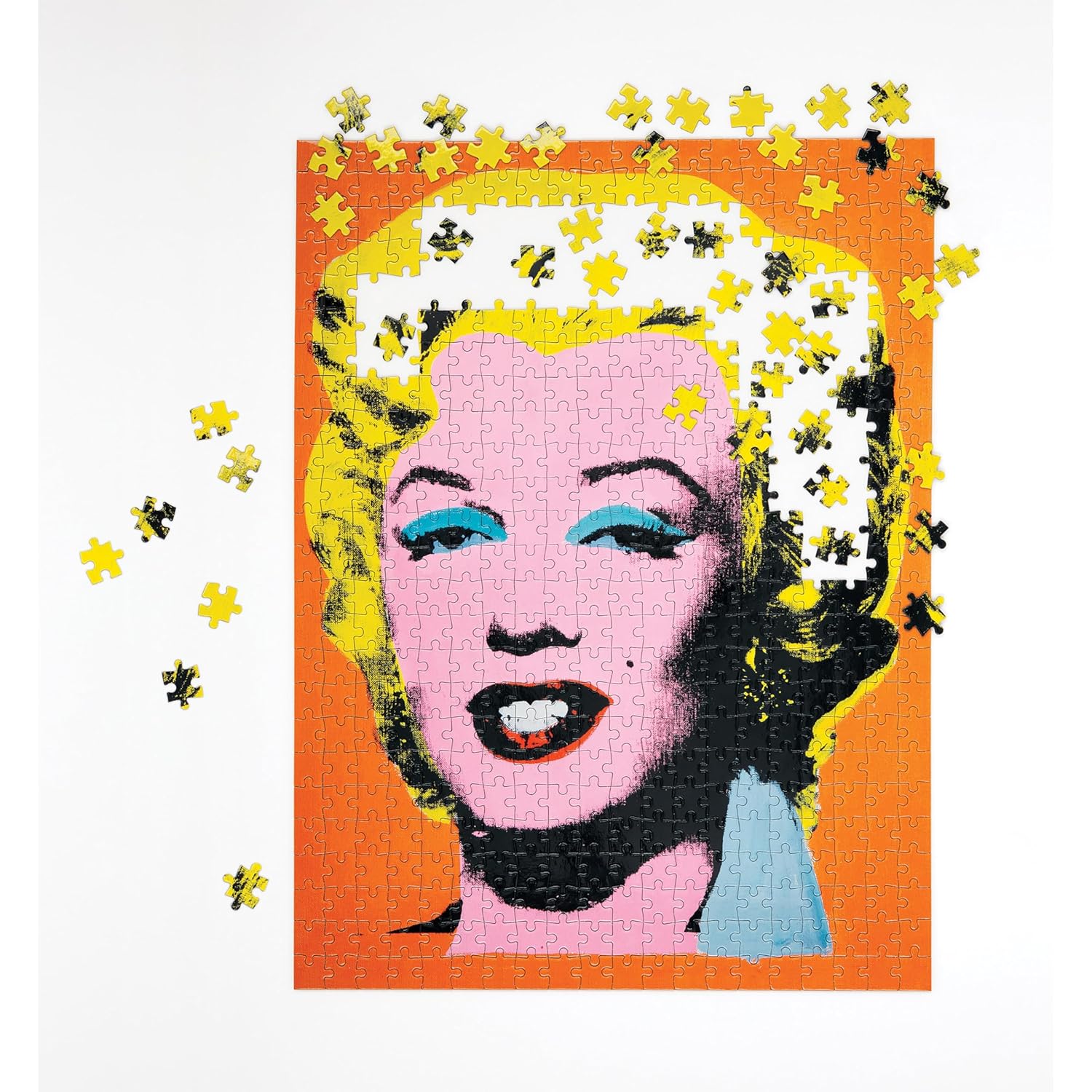 puzzle dwustronne Andy Warhol Marilyn z kolorowym portretem Marilyn Monroe na pomarańczowym tle