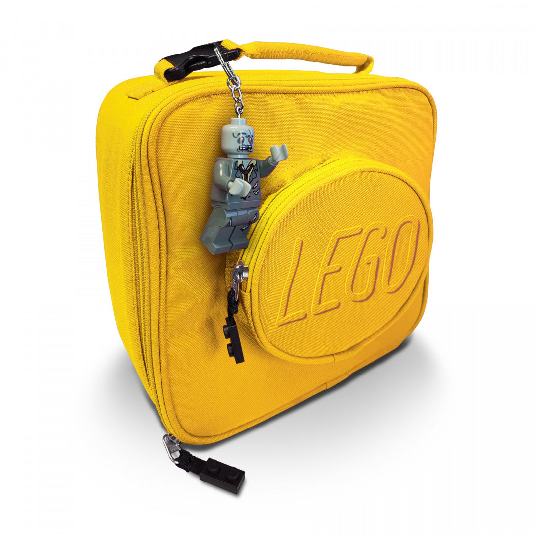 Żółta torba LEGO z brelokiem z latarką LEGO w kształcie minifigurki z kluczem