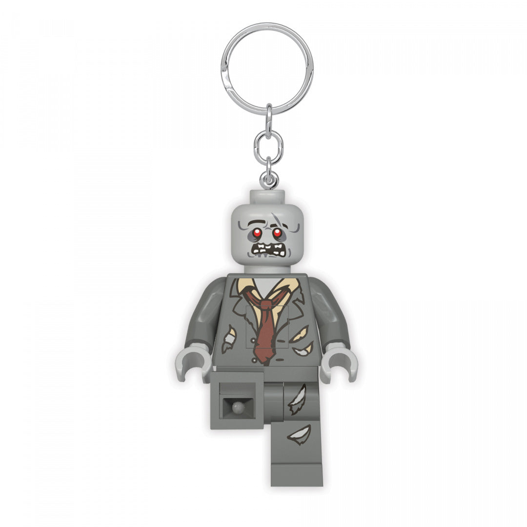 Brelok z latarką LEGO w kształcie szarej postaci zombie z czerwonymi oczami i uszkodzonym garniturem