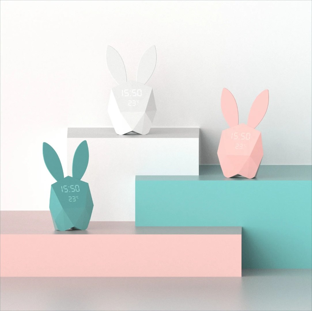 Budzik z lampką dla dzieci w kształcie króliczka w trzech pastelowych kolorach od WABOBA AB