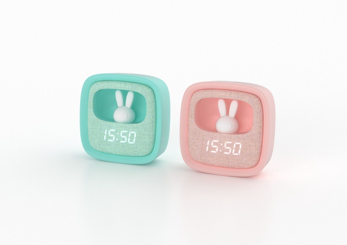 Budzik dla dzieci z lampką w kolorze różowym i miętowym z wyświetlaczem cyfrowym i kształtem królika