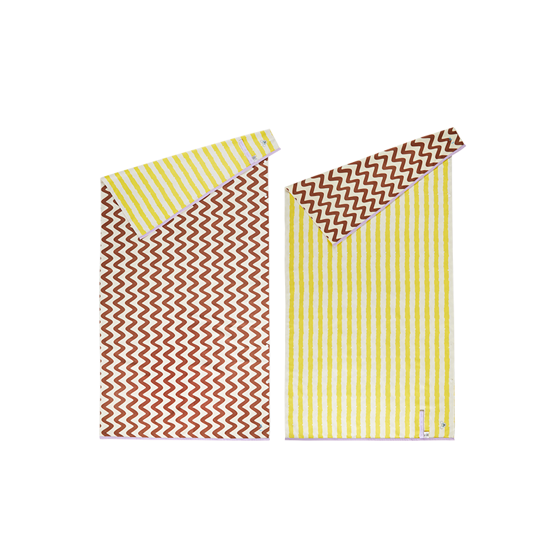 MOB dwustronny ręcznik szybkoschnący w żółte i brązowe wzory z falami i paskami