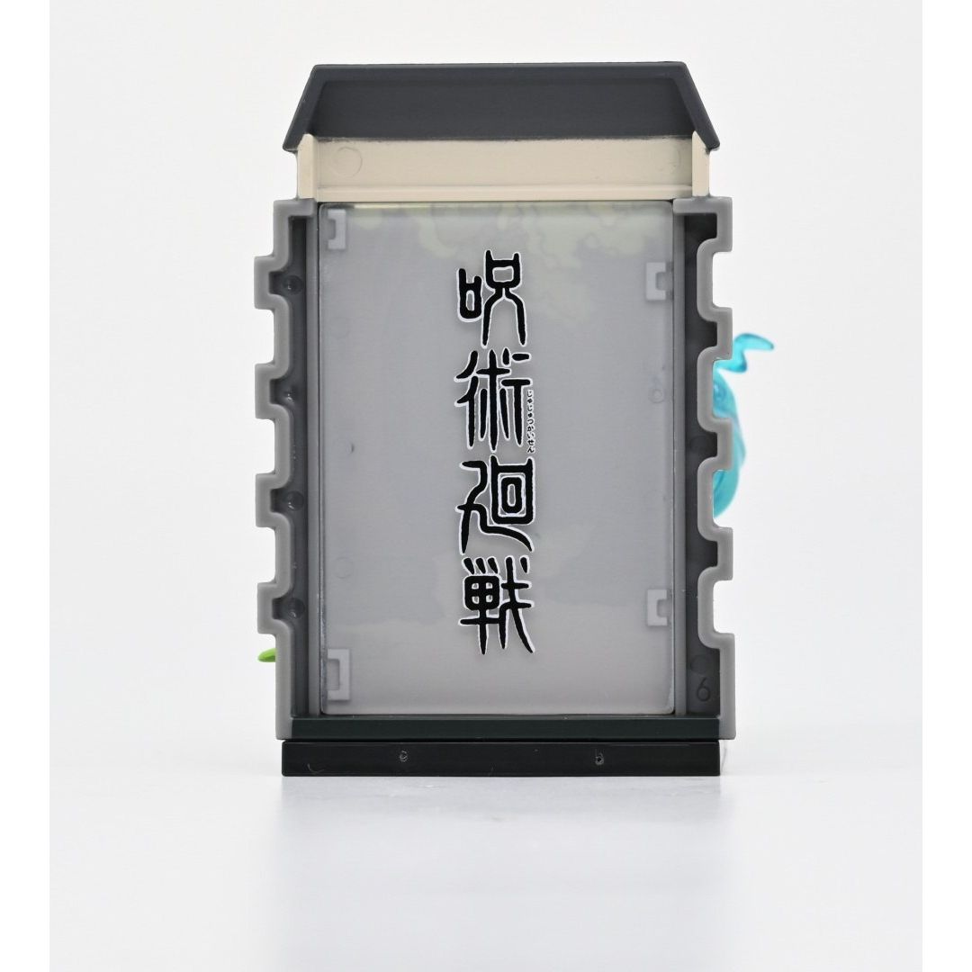 Jujutsu Kaisen kapsuła niespodzianka Yamann z japońskimi znakami na szarej obudowie