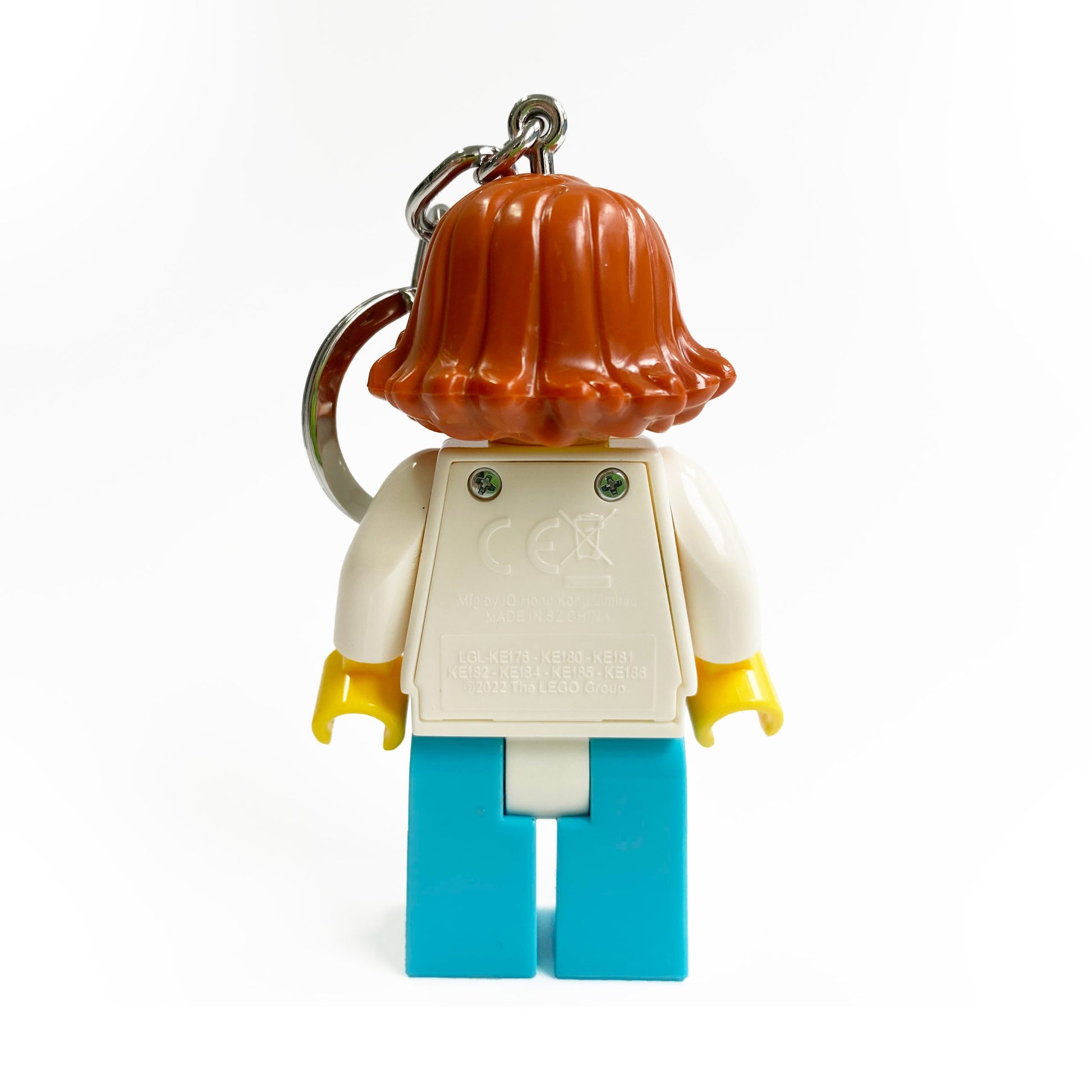 Brelok lego latarka lekarka z postacią figurki w białym ubraniu i niebieskich spodniach