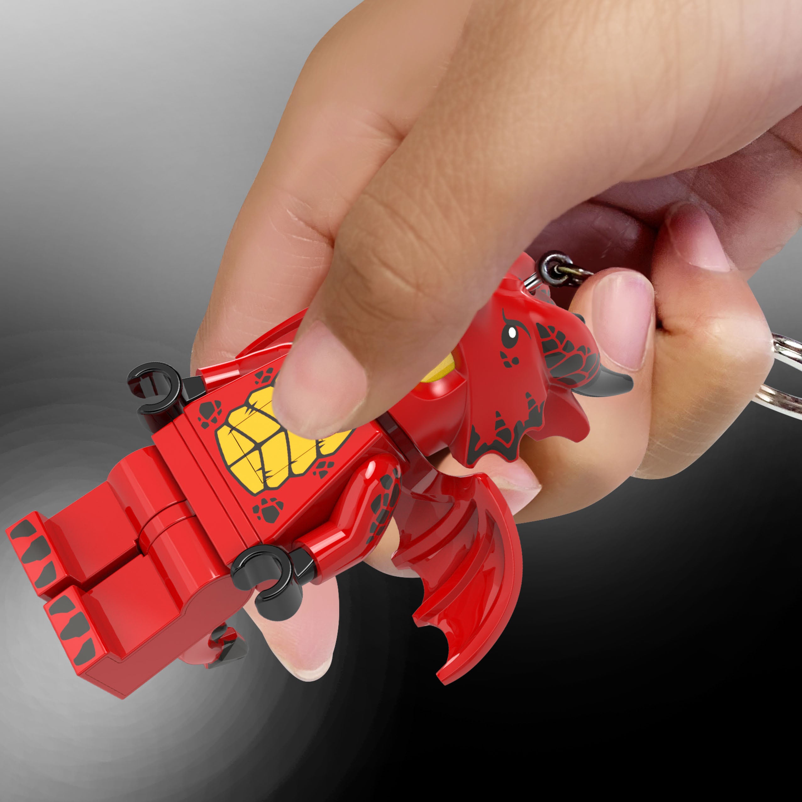 Brelok z latarką LEGO smok czerwony z ruchomymi skrzydłami i kluczem do mocowania od MOB