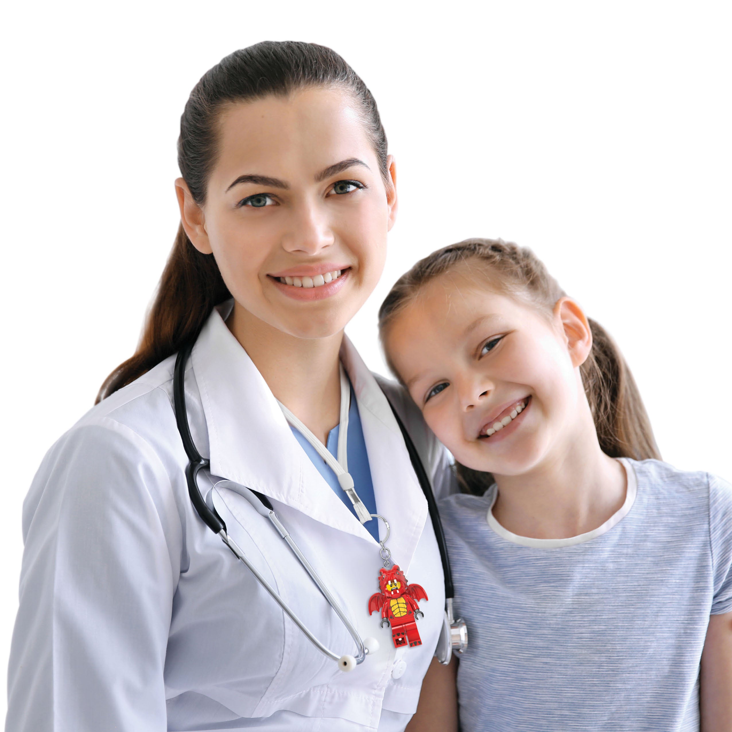 Brelok z latarką LEGO smok zawieszony na białym fartuchu lekarza uśmiechnięty lekarz z dziewczynką