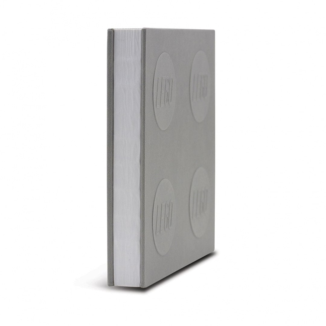 Notatnik LEGO szary z czterema wypukłymi kółkami na okładce imitującymi klocki LEGO