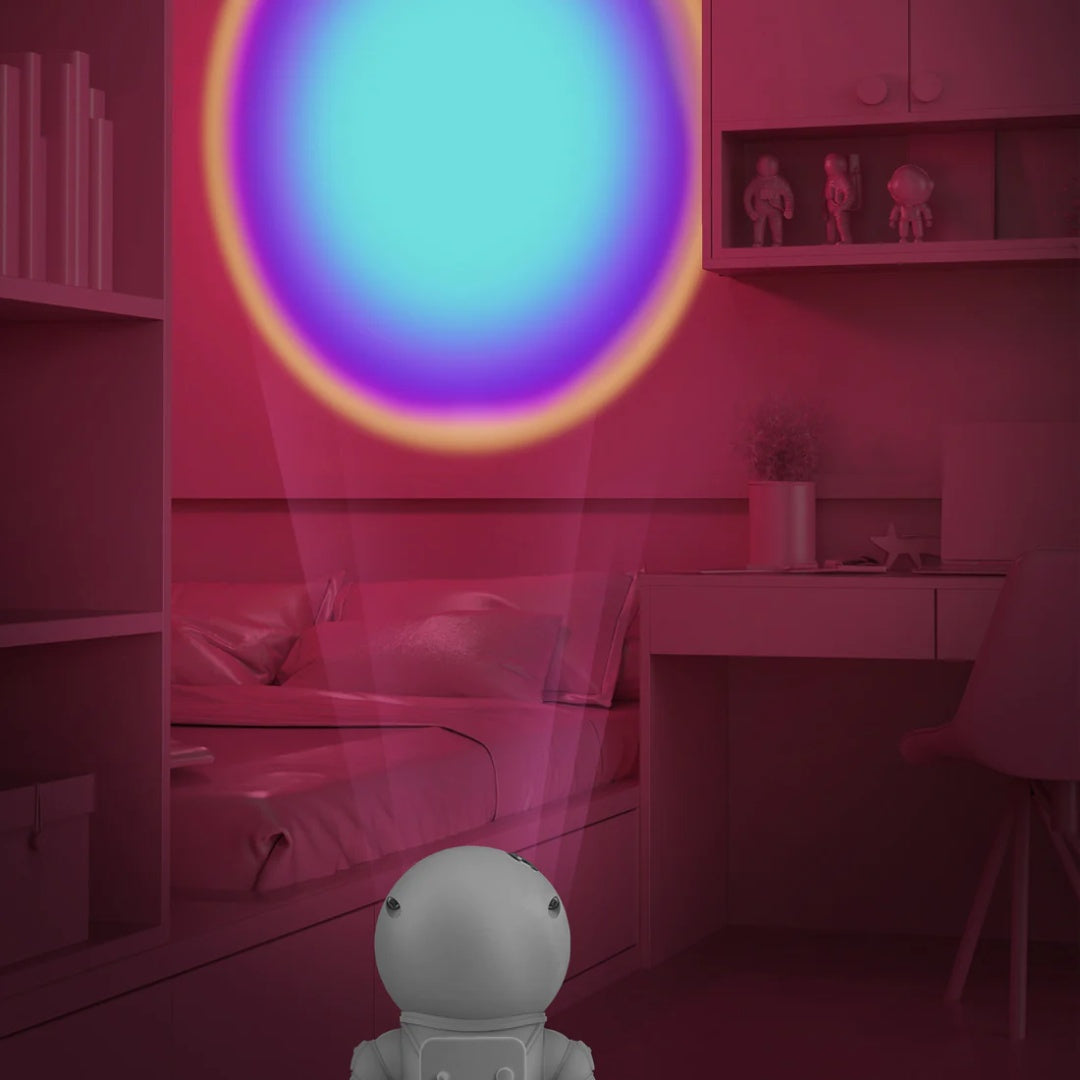 Lampka projekcyjna astronauta BV JACOB COMPANY rzucająca kolorowe światło na ścianę w pokoju dziecięcym