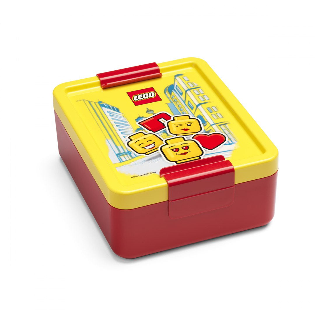 Lunchbox LEGO dla dziewczynki w czerwono-żółtym kolorze z motywem klocków LEGO