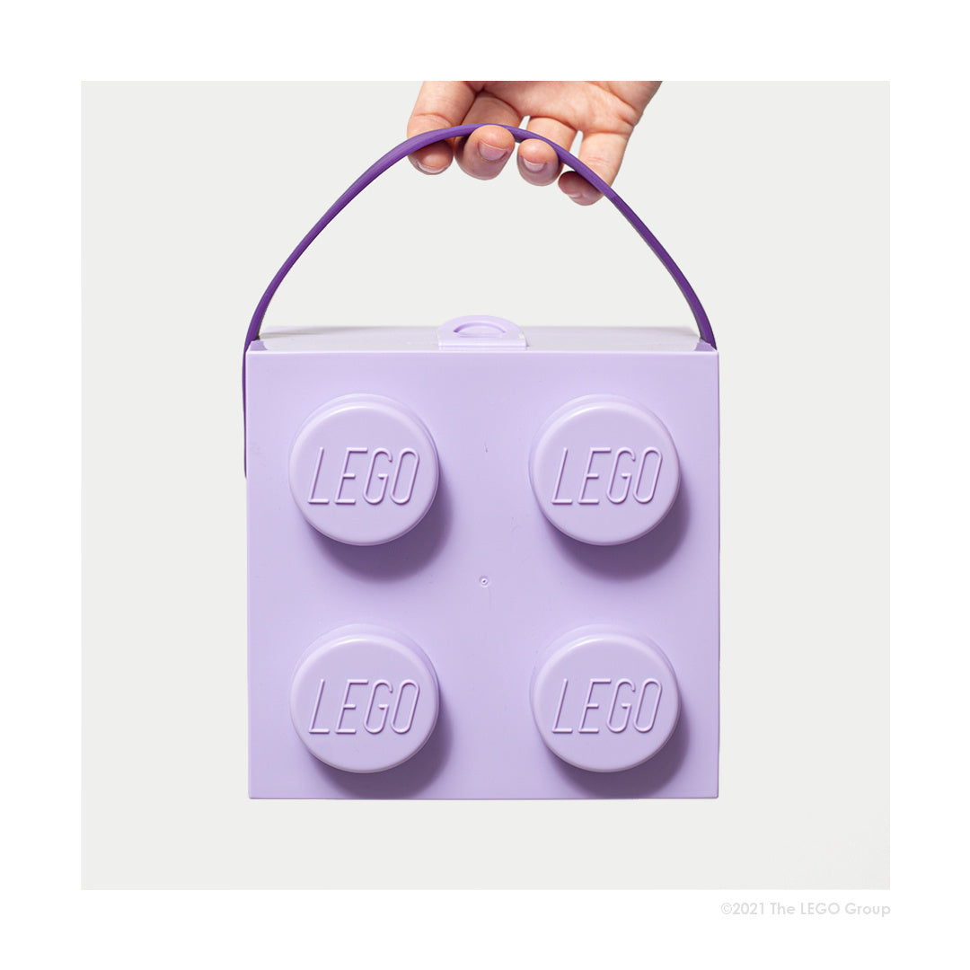 Lunchbox LEGO fioletowy w kształcie klocka z uchwytem do przenoszenia