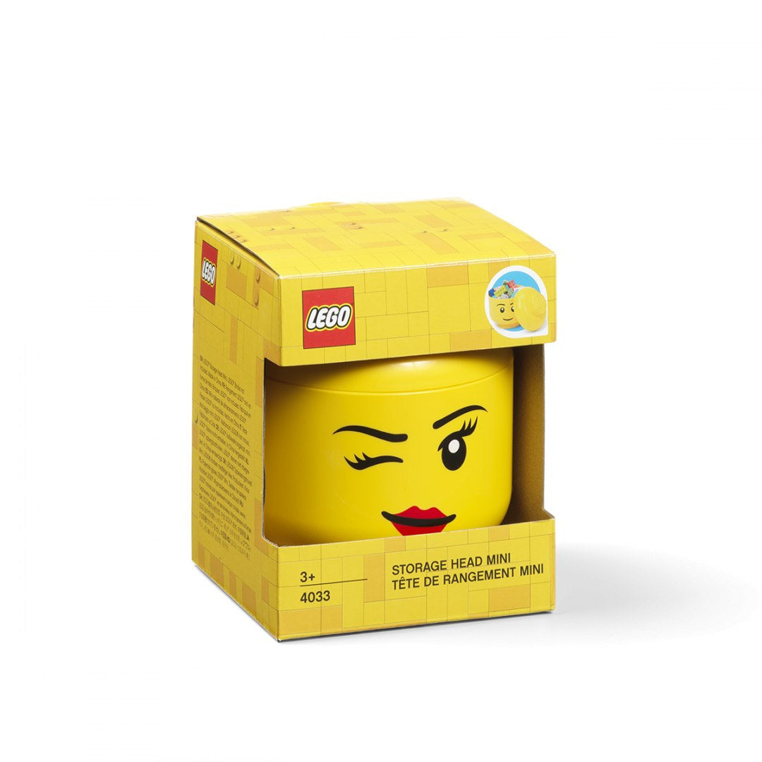 Pojemnik LEGO głowa dziewczynka żółty w opakowaniu z mrugającą minifigurką LEGO