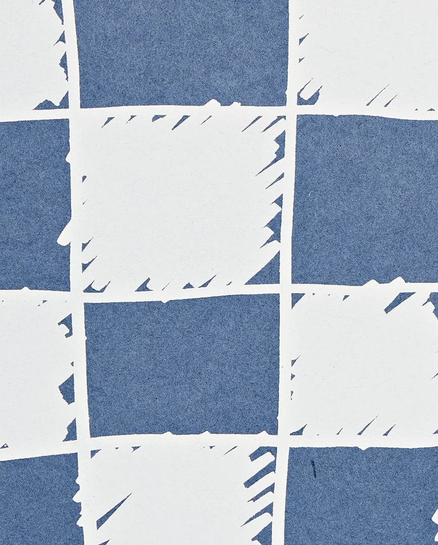 Fragment notatnika w kratkę z niebiesko-białym wzorem od BV JACOB COMPANY