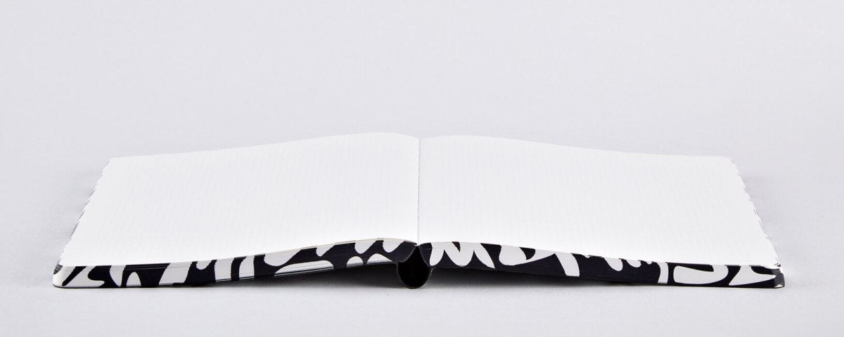 Notatnik graficzny L BV JACOB COMPANY z czarno-białą okładką i pustymi białymi stronami