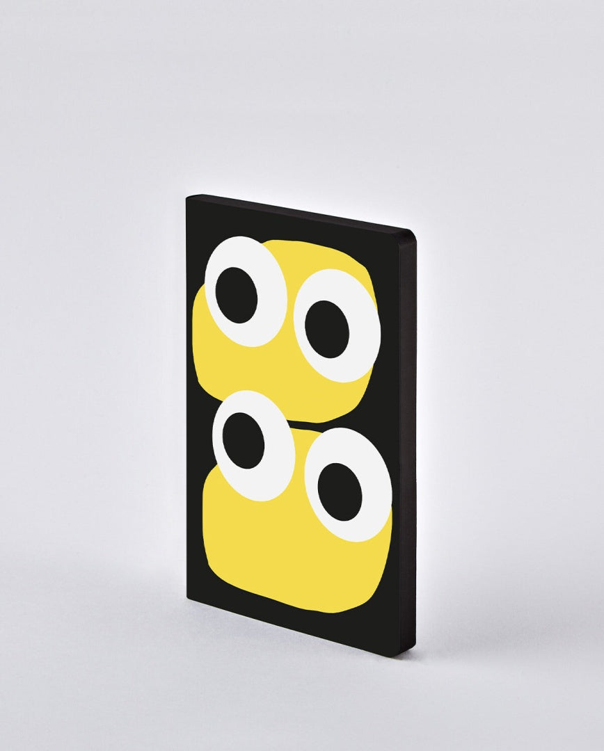 Notatnik graficzny Jim w czarnej okładce z żółto-białym abstrakcyjnym wzorem oczu