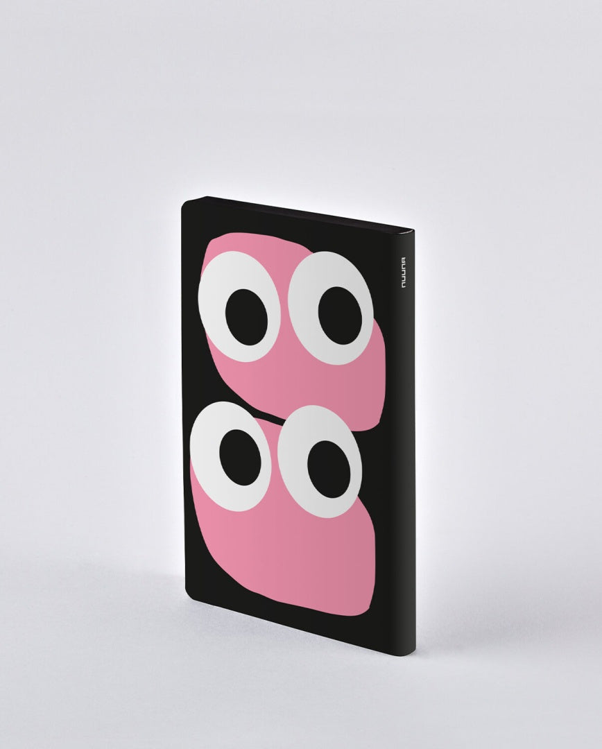 Notatnik graficzny Jim BV JACOB COMPANY z czarną okładką i różowymi grafikami z oczami