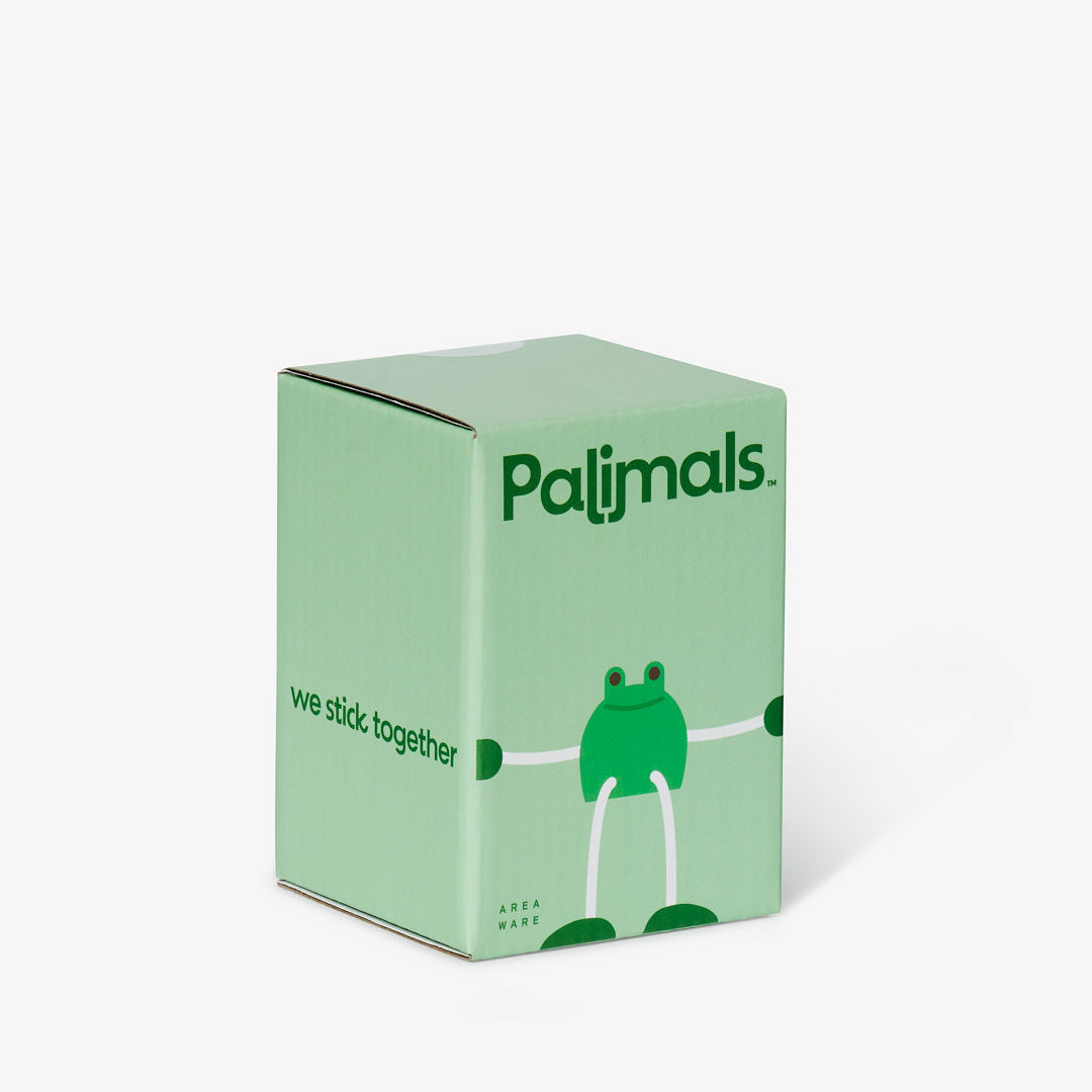 Opakowanie Palimals z zieloną drewnianą figurką żaba od Areaware