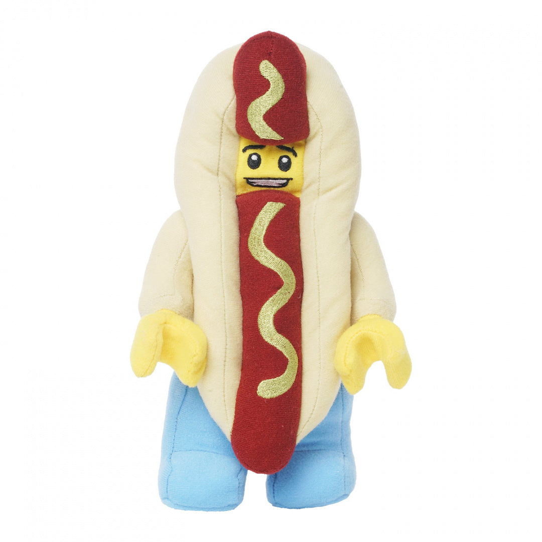 Pluszak LEGO hot dog z miękkiego materiału w kształcie hot doga z uśmiechniętą twarzą i niebieskimi nogawkami