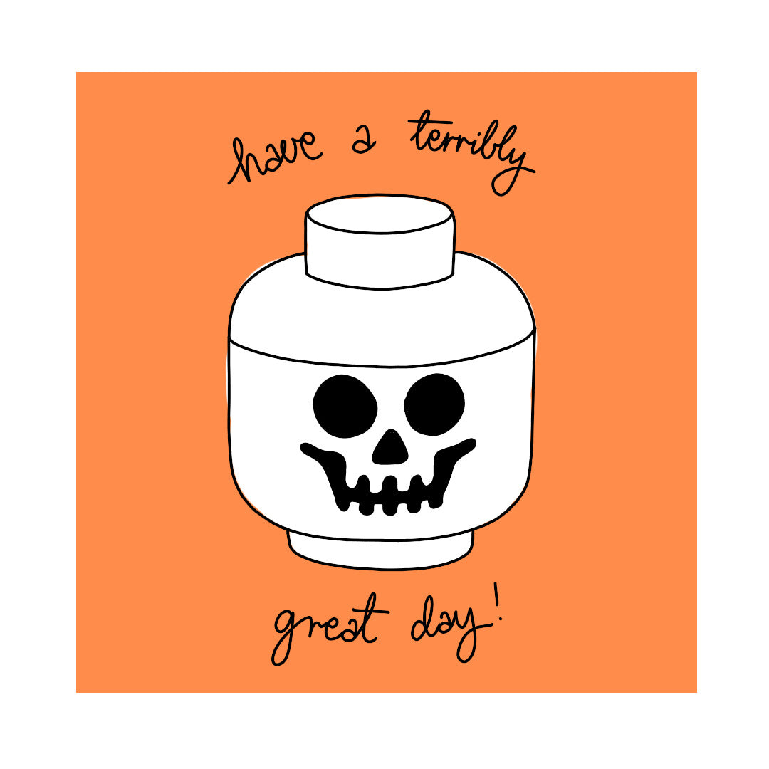 Pojemnik LEGO głowa szkieletor w białym kolorze na pomarańczowym tle z napisem