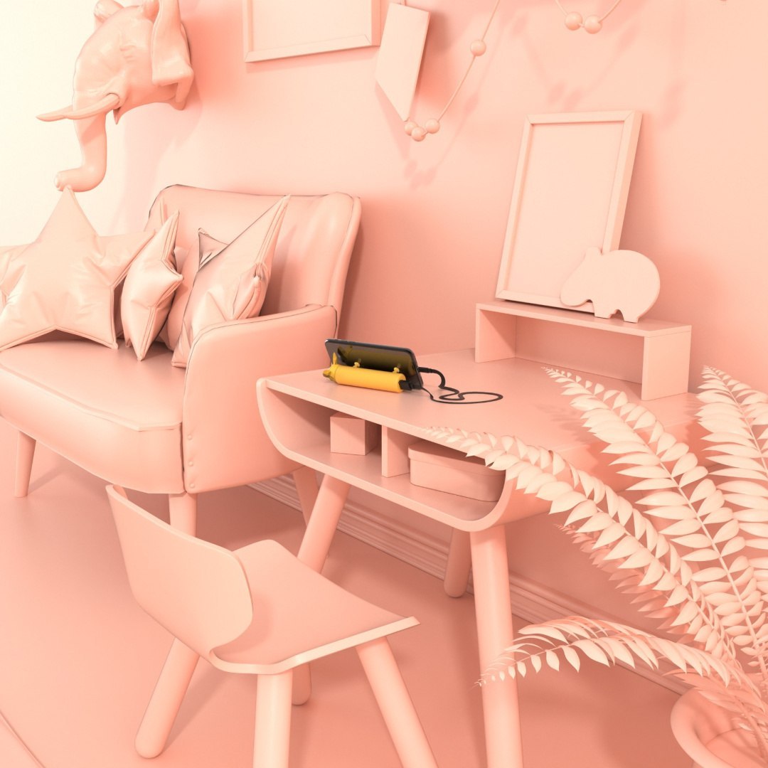 Powerbank piesek corgi od Yamann na biurku obok różowego pokoju z sofą i rośliną