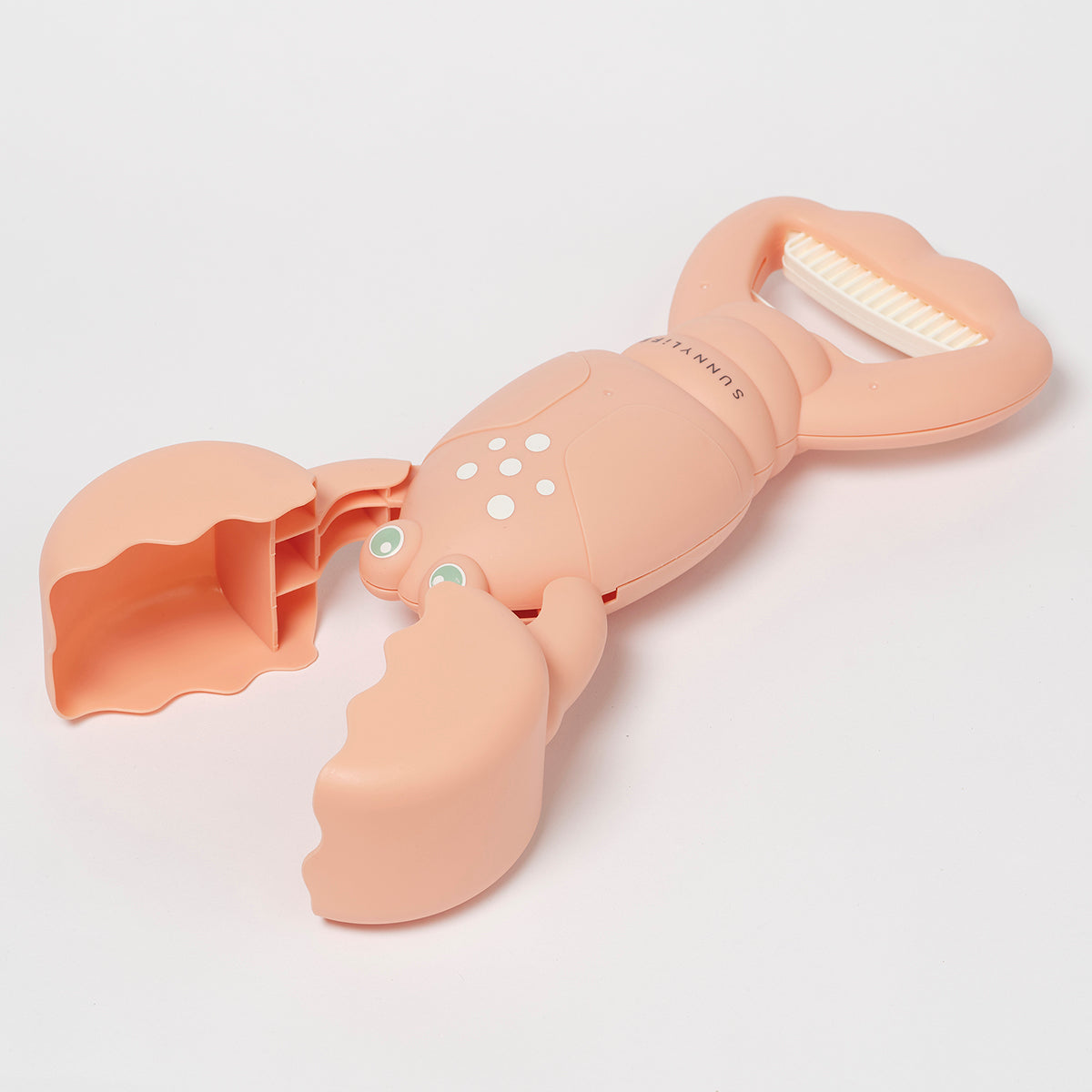 Łapki do piasku dla dzieci w kształcie kraba marki LOQI w kolorze brzoskwiniowym