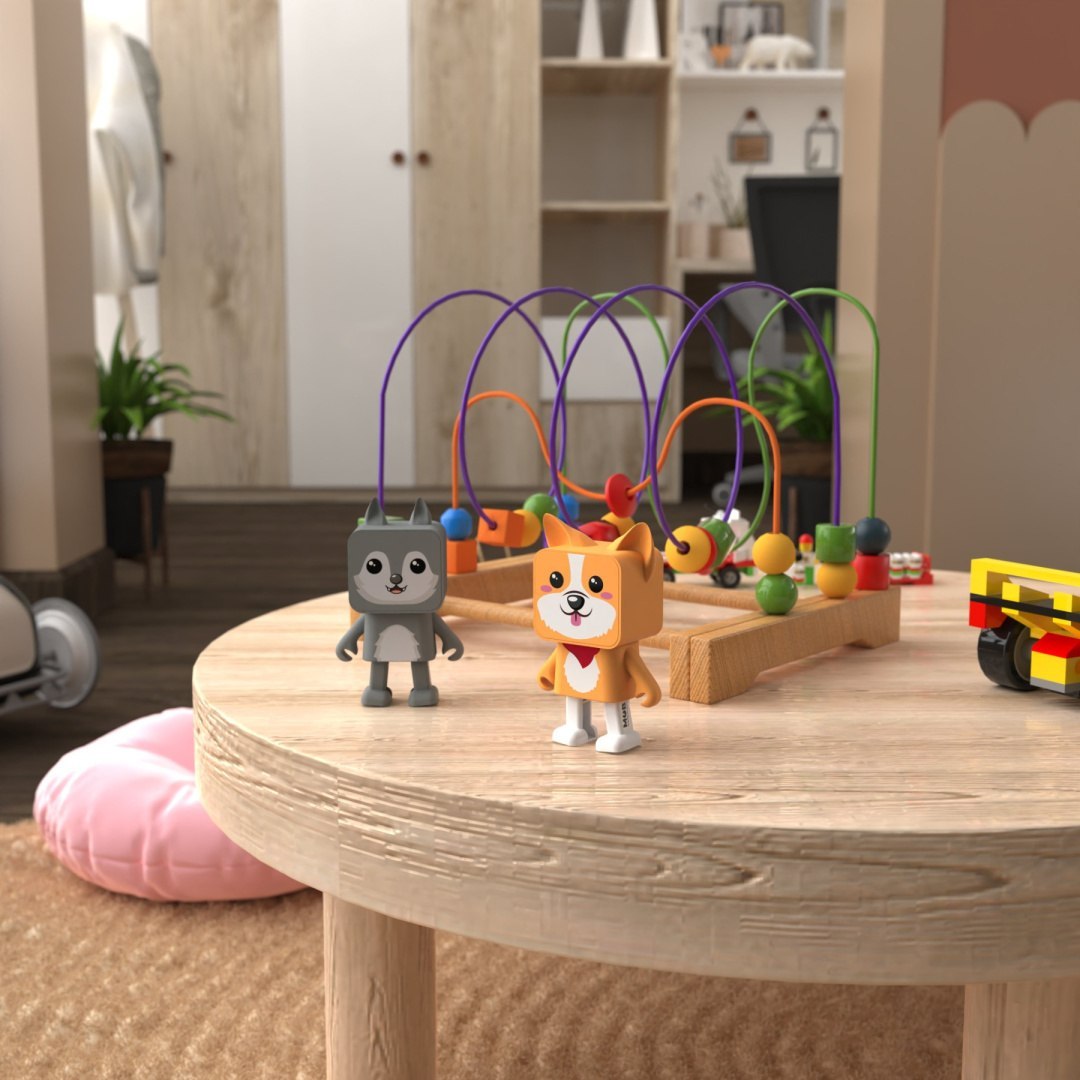 Głośnik bezprzewodowy corgi w kształcie psa na drewnianym stole obok zabawek dziecięcych