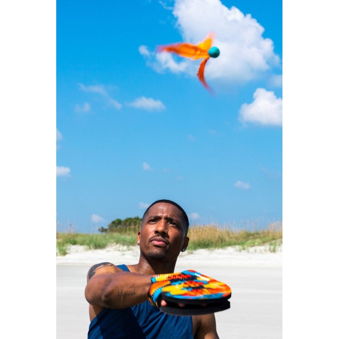 Terenowa gra zręcznościowa dla dzieci Waboba z kolorową rakietą do zabawy na plaży