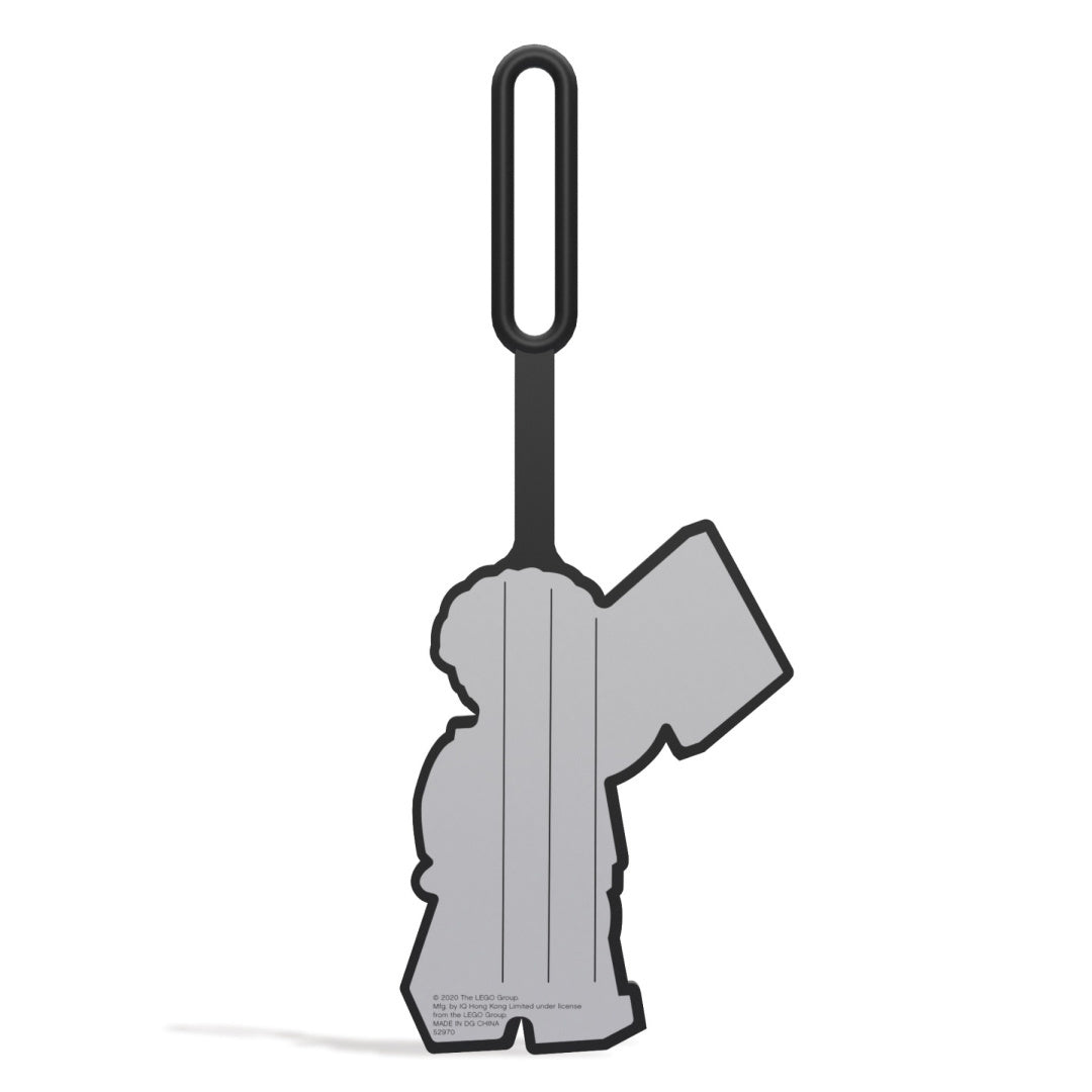 Czarna zawieszka LEGO chirurg z sylwetką postaci chirurga na białym tle