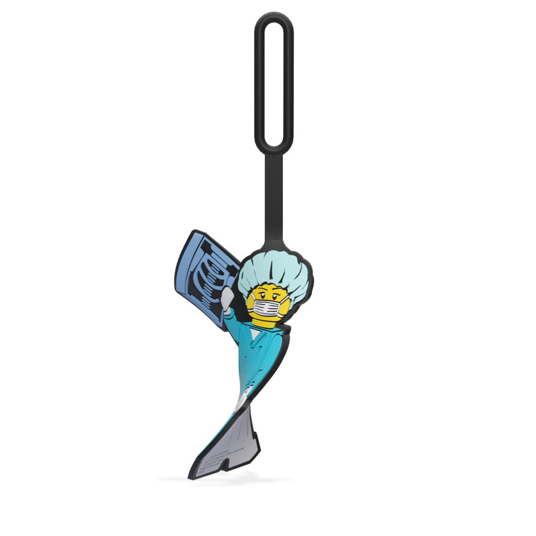 Zawieszka LEGO chirurg w niebieskim uniformie medycznym z maską i prześwietleniem rentgenowskim