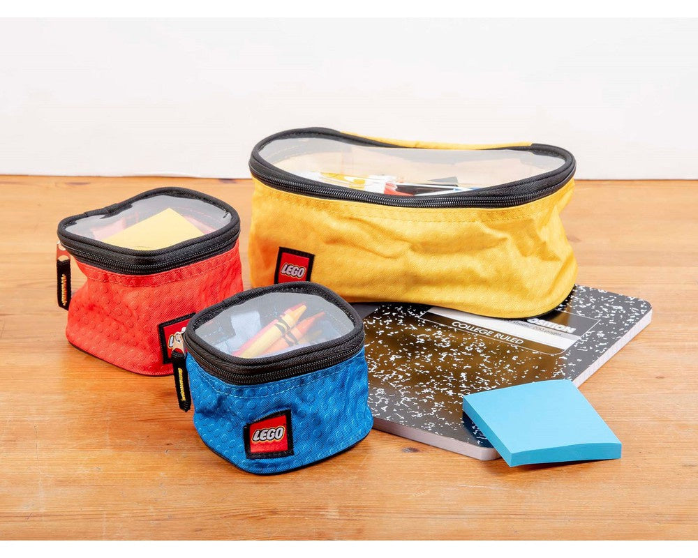 Zestaw organizery LEGO na klocki w trzech kolorach żółtym, czerwonym i niebieskim z przezroczystymi pokrywami