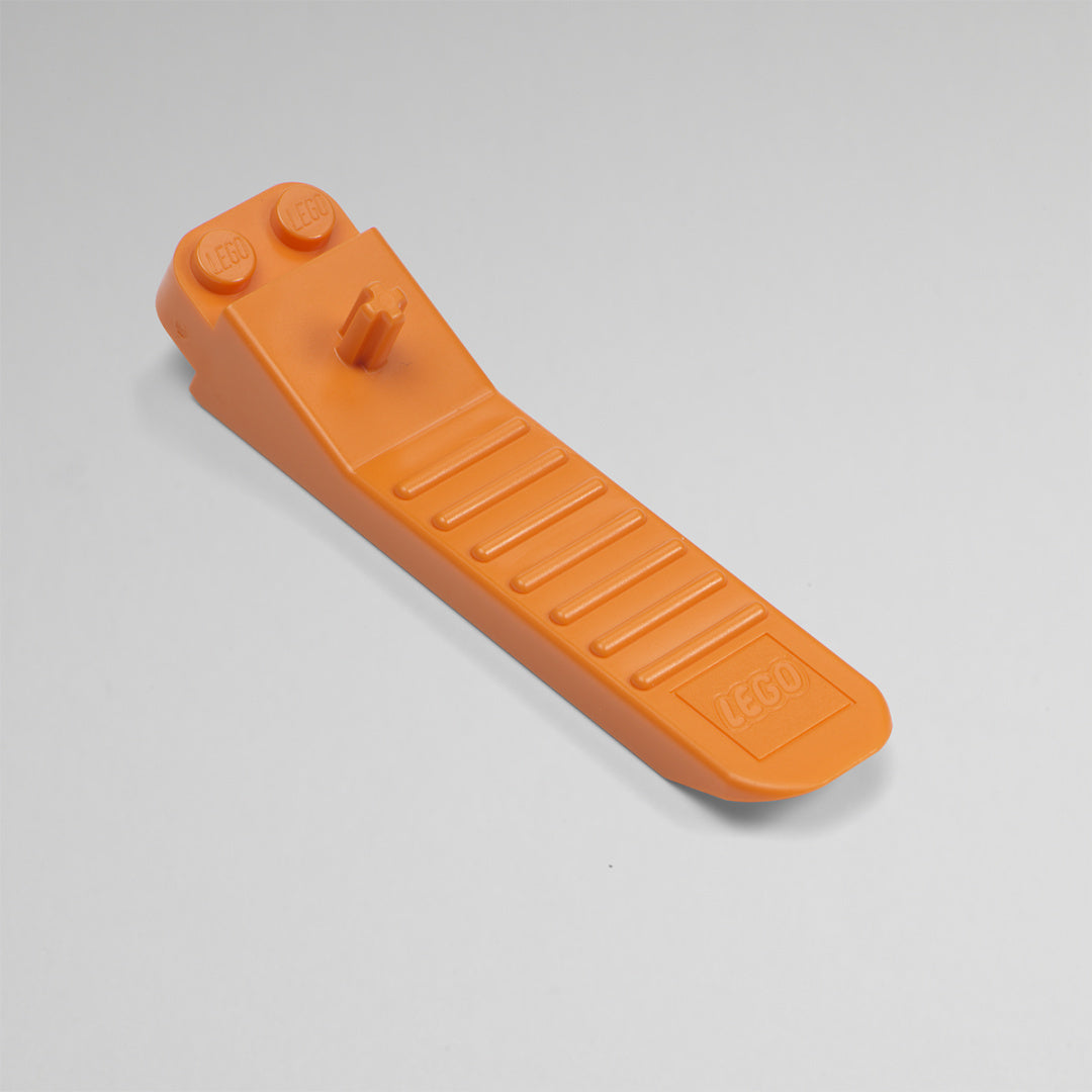 Pomarańczowa szufelka do klocków LEGO do łatwego sprzątania z logo LEGO