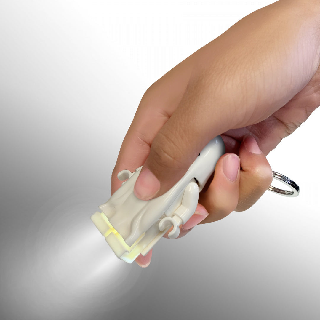 Brelok z latarką LEGO Duch w kształcie ducha świecący w dłoni, produkt MOB