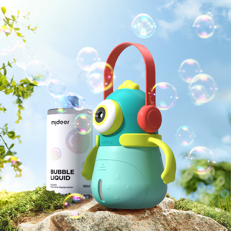 Płyn do baniek mydlanych 500ml Yamann obok kolorowego automatycznego urządzenia do tworzenia baniek na tle nieba