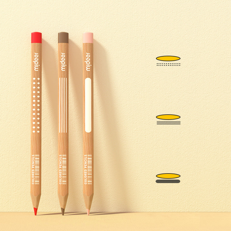 Trzy kredki olejne marki Yamann w żywych kolorach z naturalnym drewnianym korpusem