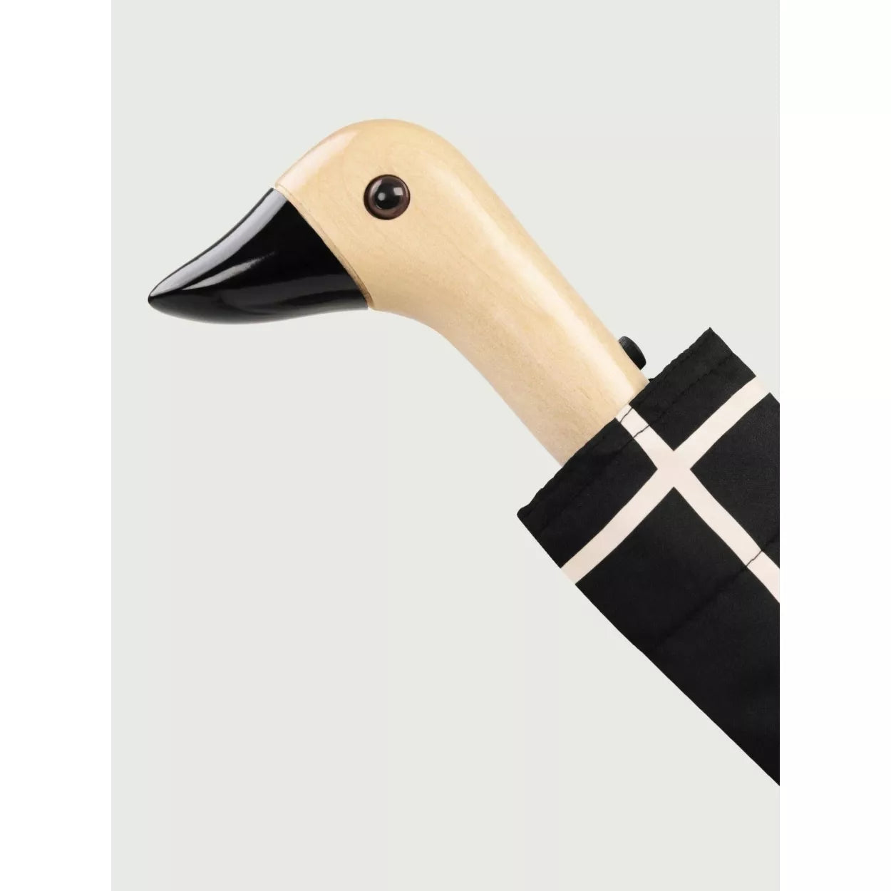 Parasolka z rączką w kształcie kaczki od WABOBA AB z czarno-białym pokrowcem