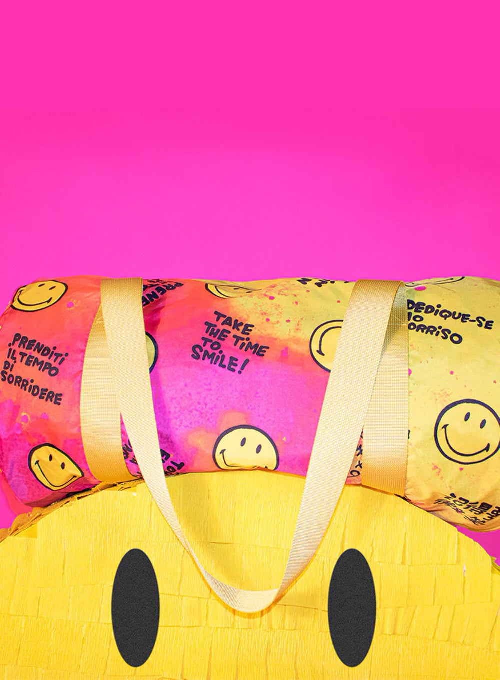 Kolorowa torba weekendowa SMILEY z motywem uśmiechniętych buziek na różowo-żółtym tle