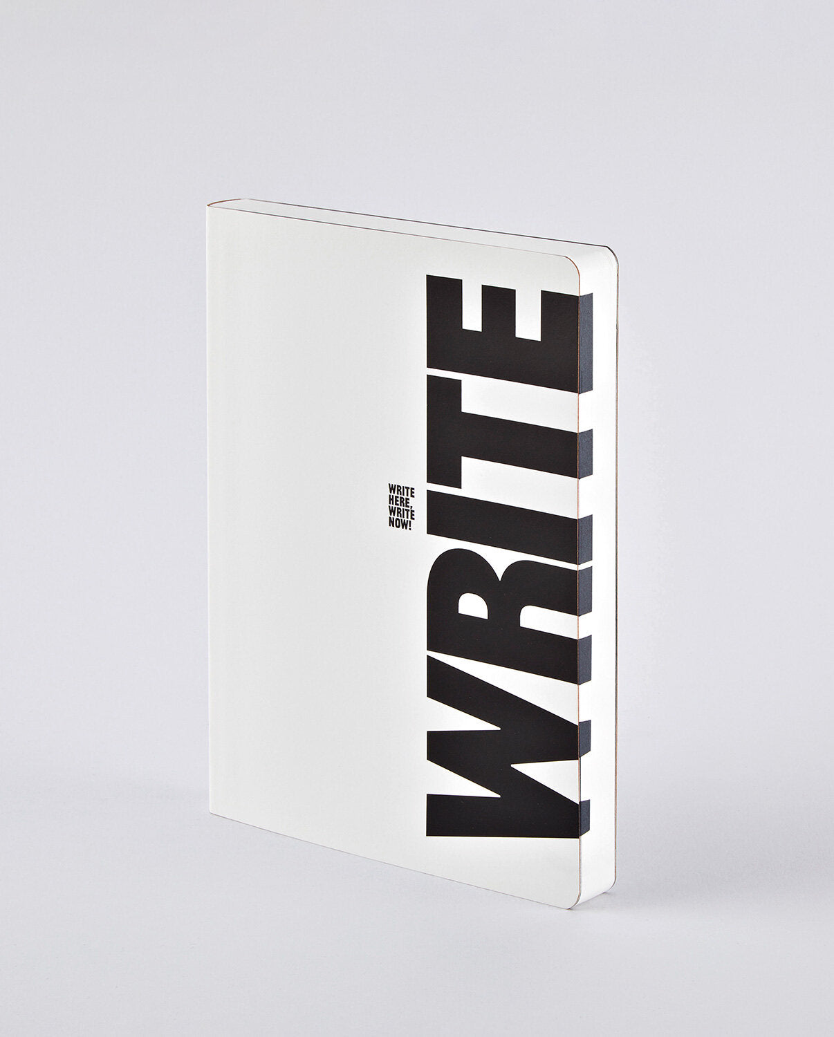 Notatnik graphic L z białą okładką i dużym napisem WRITE czarnymi literami