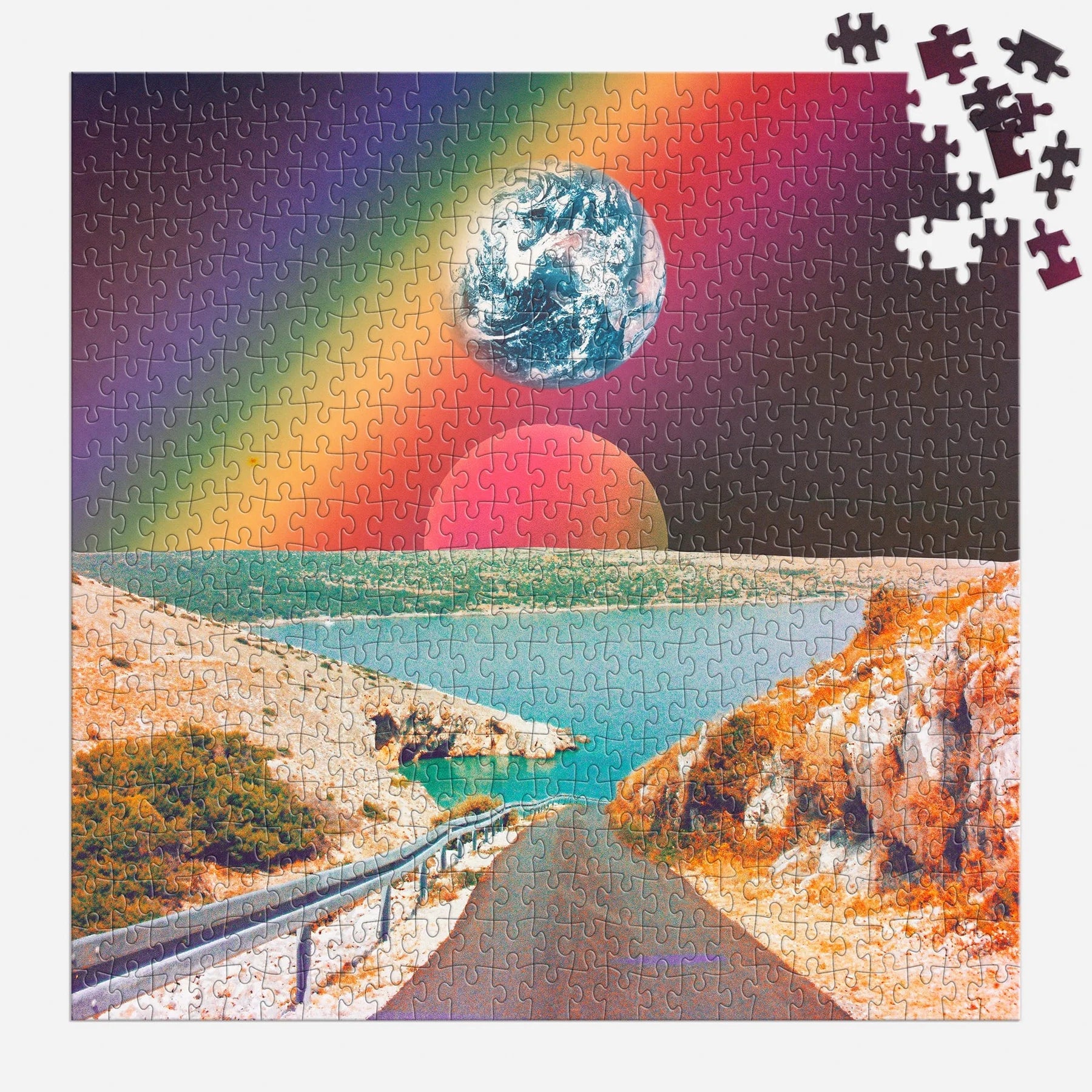 Puzzle 500 elementów kosmiczna tęcza przedstawiające surrealistyczny krajobraz z drogą, wodą, kolorową tęczą i planetami na niebie
