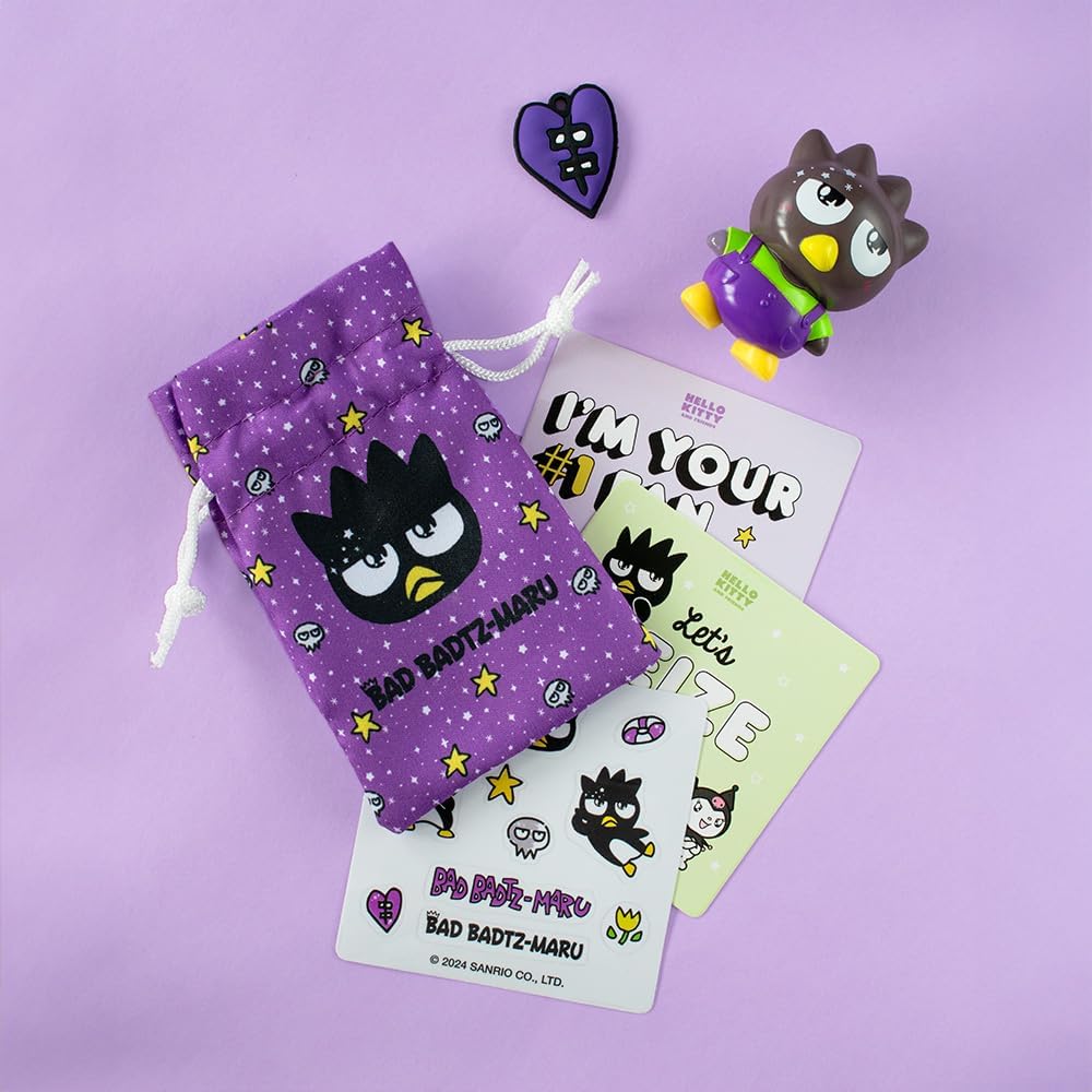 Badtz-Maru Hello Kitty figure with a purple pouch and collector cards from LOQI