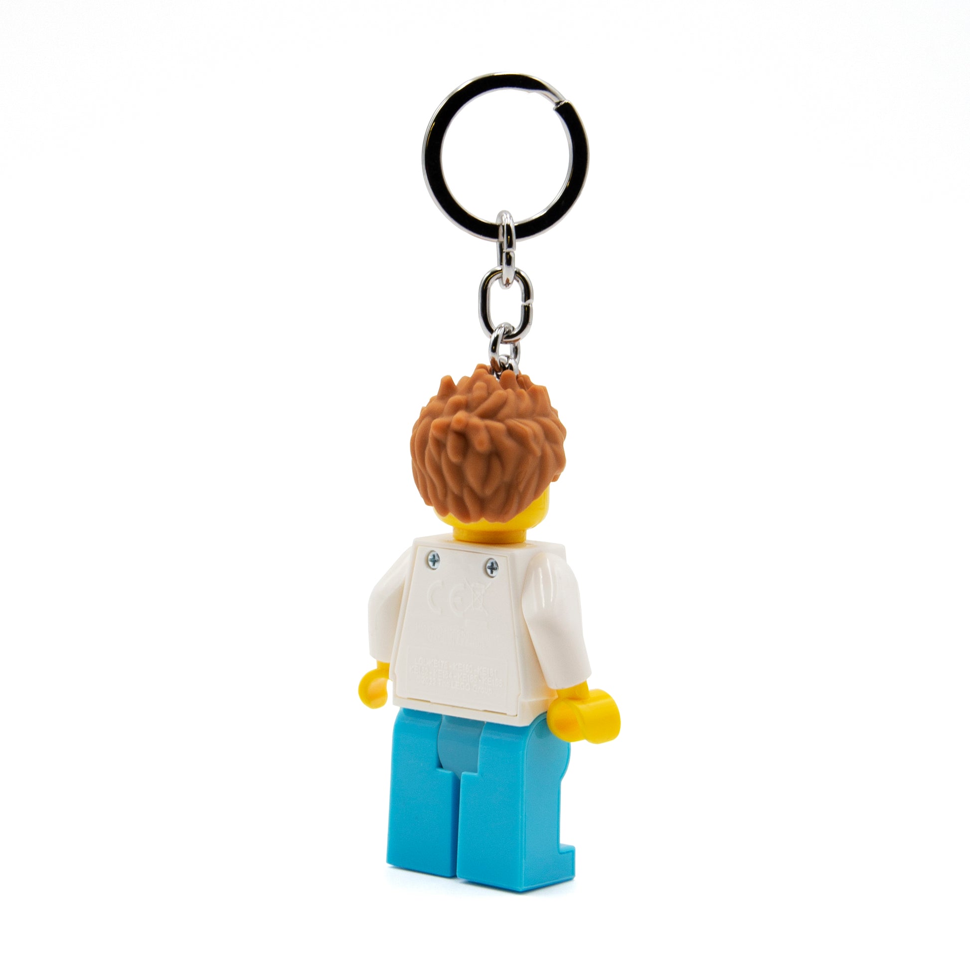 Brelok LEGO lekarz z latarką widoczny od tyłu z niebieskimi spodniami i białą kurtką