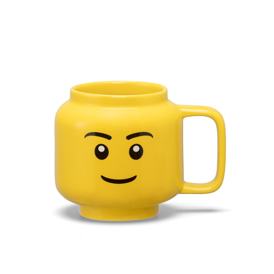 Żółty kubek LEGO ceramiczny chłopiec z uśmiechniętą twarzą i uchwytem po prawej stronie