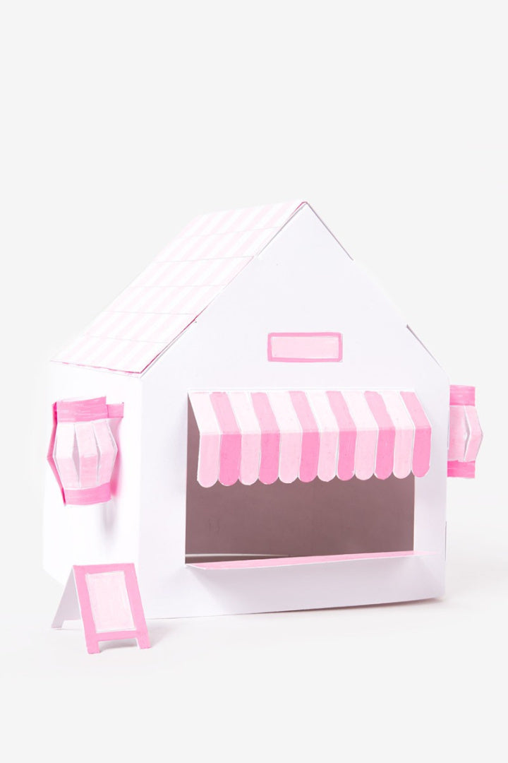 Papierowy model kawaii shop w kształcie małego sklepiku z różowymi elementami dekoracyjnymi